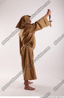 JOEL_ADAMSON MONK WITH CRUCIFIX